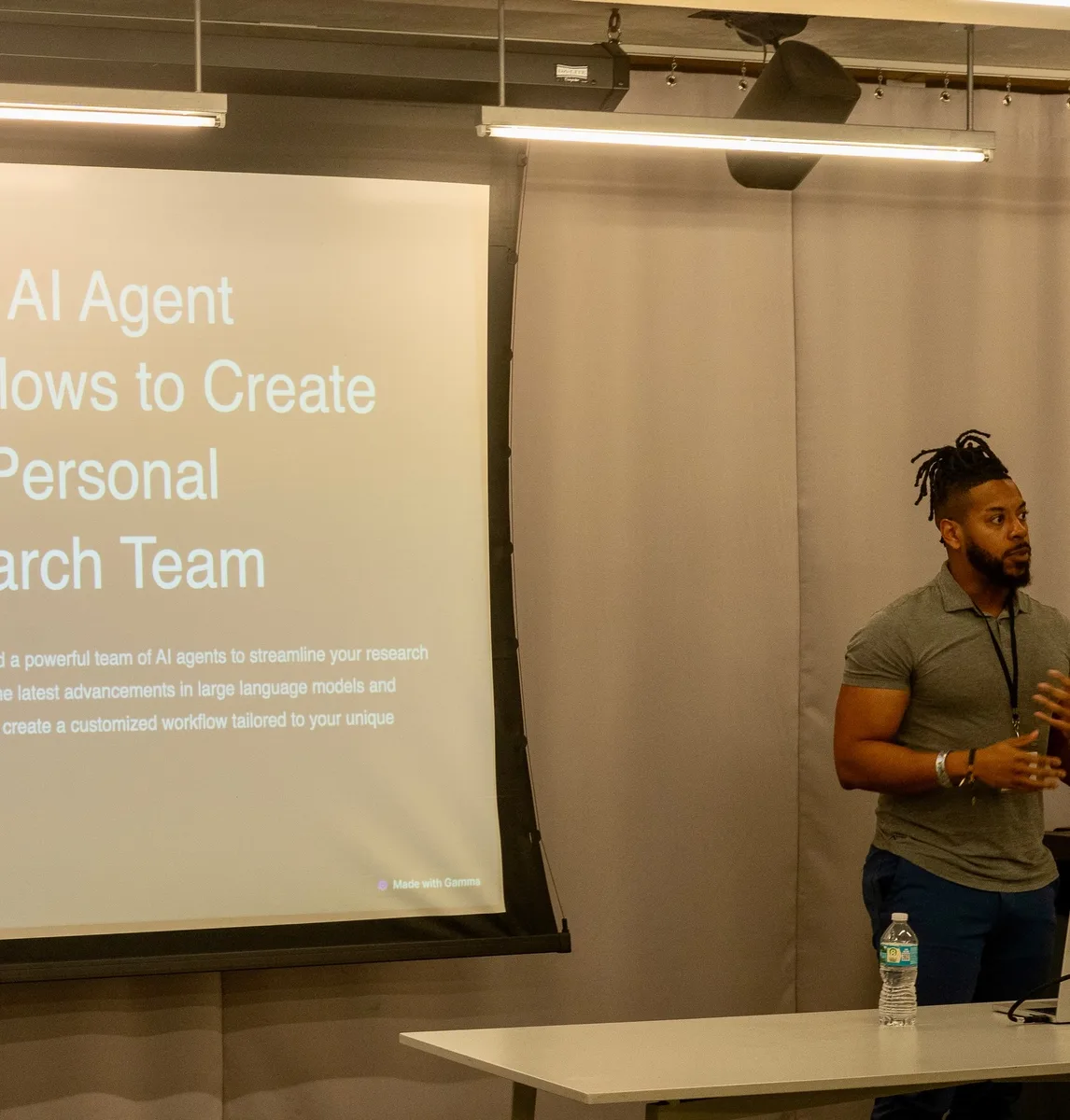 MJ Hill presenting an AI agent workflow