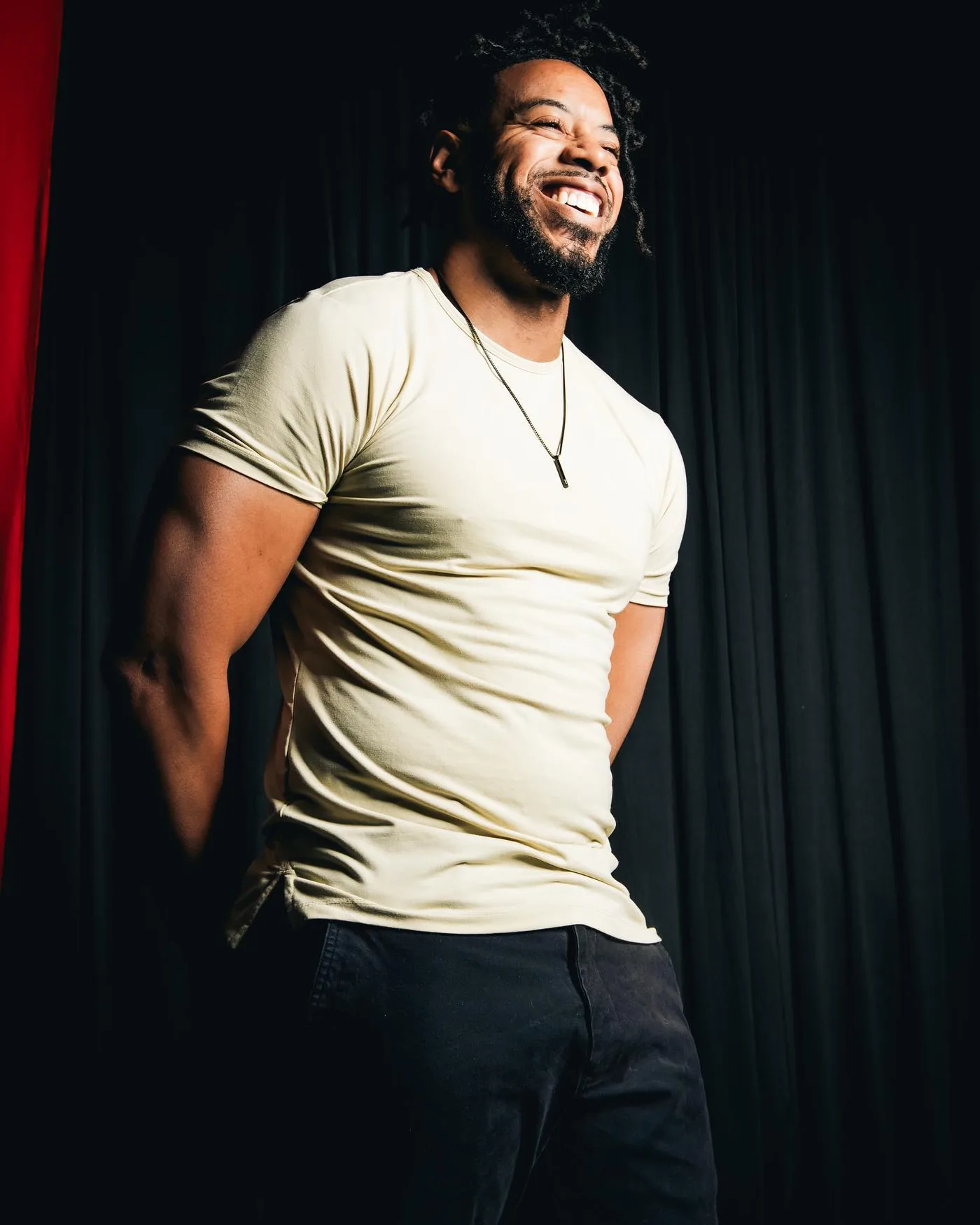 Fitness portrait of William in a fitted cream T-shirt