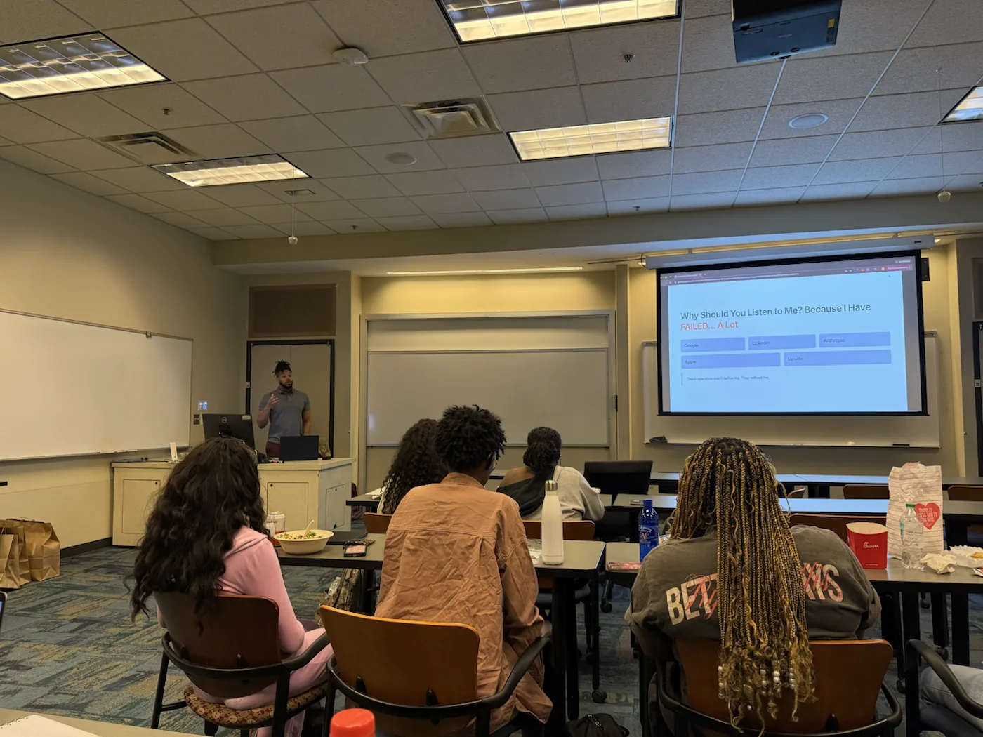 MJ Hill presenting the Cracking the Technical Interview seminar to Sister Circle at Emory University